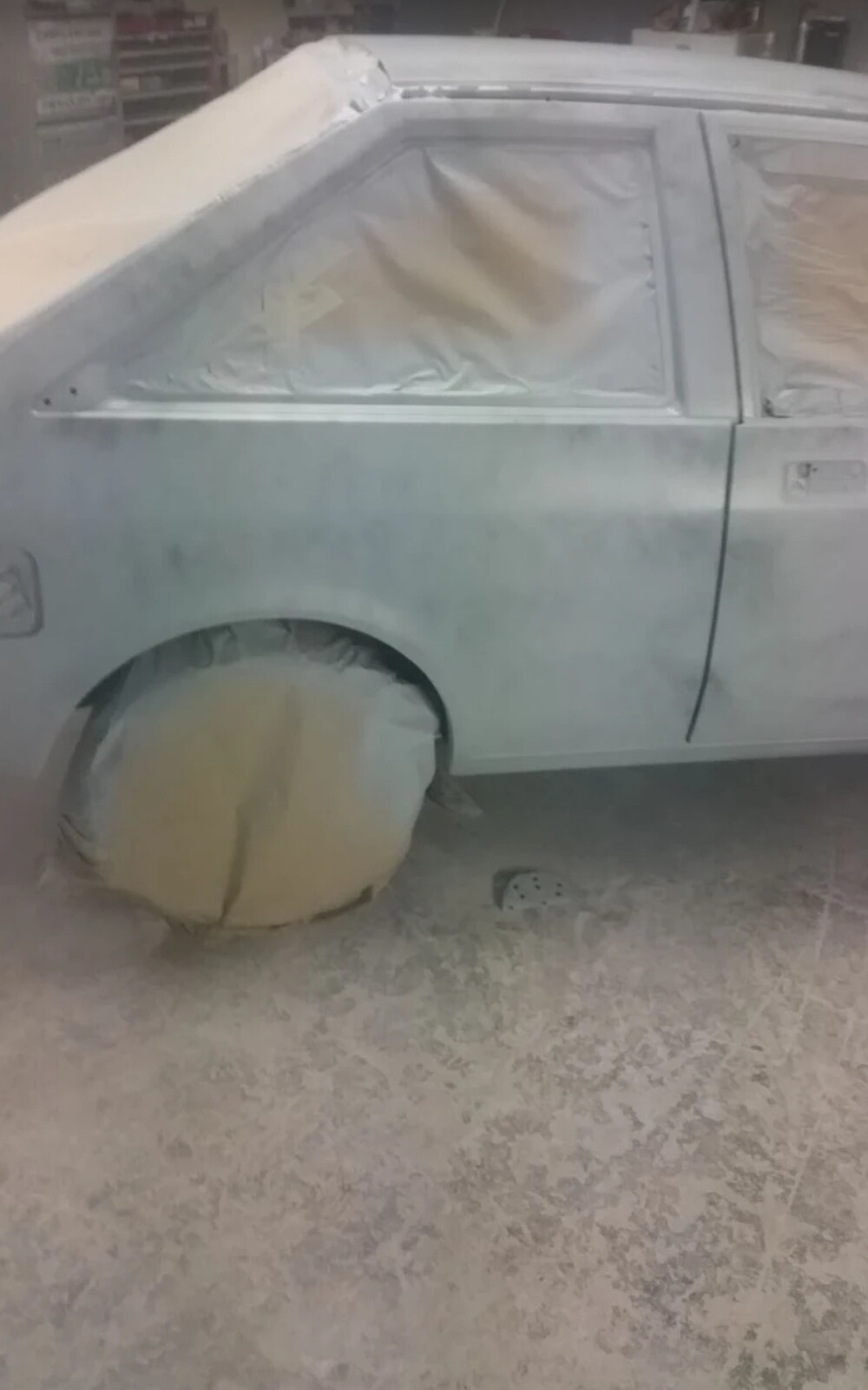 Car masked up for painting in the King Automotive Oldbury workshop